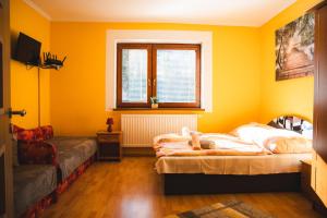 A bed or beds in a room at Vilka Stefi