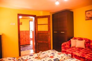 A bed or beds in a room at Vilka Stefi