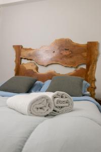 Postel nebo postele na pokoji v ubytování Casa Hotel Alicia Filandia