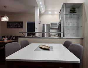 Kuchyň nebo kuchyňský kout v ubytování GM Home