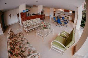 Гостиная зона в Apartamento Hotsprings em Caldas Novas