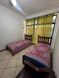 Postel nebo postele na pokoji v ubytování Conforto e Praia