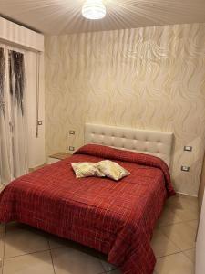 Postel nebo postele na pokoji v ubytování Appartamento con ampio terrazzo vista mare