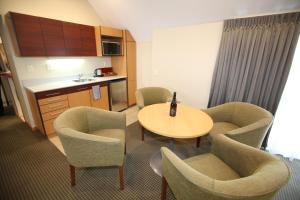 Kuchyň nebo kuchyňský kout v ubytování Dunedin Leisure Lodge - Distinction