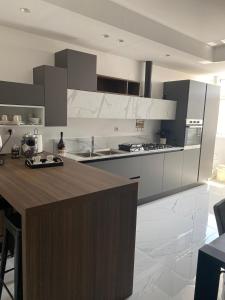 Kuchyň nebo kuchyňský kout v ubytování Maison ì apartment