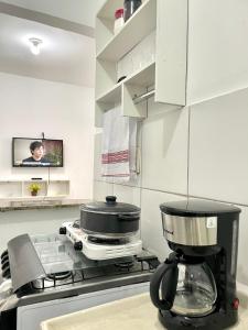 Kuchyň nebo kuchyňský kout v ubytování Loft 03 Estiloso apartamento de 1 quarto Petrolina