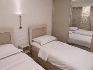 Divna客房内的一张或多张床位