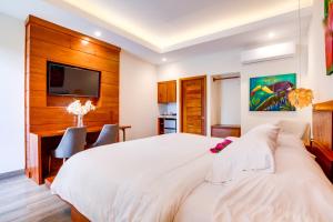 Postel nebo postele na pokoji v ubytování Belizean Dreams Resort