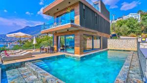 Swimmingpoolen hos eller tæt på Kalkan Kisla Bay Luxury Villa - 6440