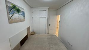 Ein Bett oder Betten in einem Zimmer der Unterkunft Playa del Cura apartment with 2 bedrooms