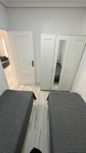 Ein Bett oder Betten in einem Zimmer der Unterkunft Playa del Cura apartment with 2 bedrooms