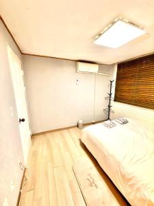 Postel nebo postele na pokoji v ubytování Private Family Home, 2-bedrooms