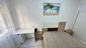 Ein Bett oder Betten in einem Zimmer der Unterkunft Playa del Cura apartment with 2 bedrooms