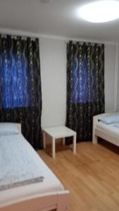 Postel nebo postele na pokoji v ubytování Rest Best L97