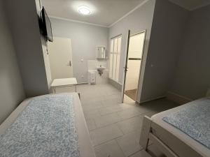 Postel nebo postele na pokoji v ubytování Rest Best L97