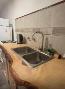 Kuchyň nebo kuchyňský kout v ubytování El destino + 3 fotografie