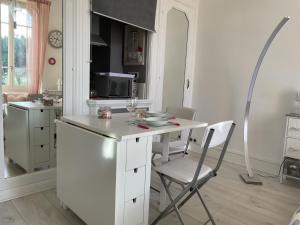 Kuchyň nebo kuchyňský kout v ubytování Douceur Pastel + 6 fotografií