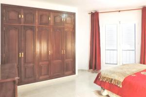 Posteľ alebo postele v izbe v ubytovaní Charming Apartment in Arrecife City Centre - 90 m² - Parking