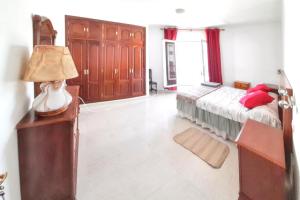 Posteľ alebo postele v izbe v ubytovaní Charming Apartment in Arrecife City Centre - 90 m² - Parking