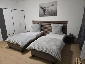 Postel nebo postele na pokoji v ubytování AlSa Apartments
