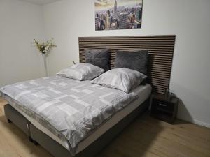 Postel nebo postele na pokoji v ubytování AlSa Apartments