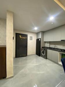 Η κουζίνα ή μικρή κουζίνα στο cozy Erbil apartment near to gulan mall