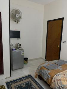 Letto o letti in una camera di Youssef Pyrameds View INN