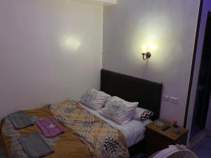 Letto o letti in una camera di Youssef Pyrameds View INN