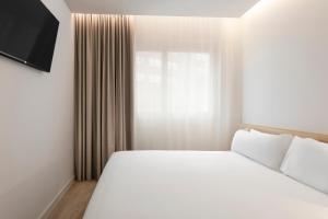 B&B HOTEL Madrid Carabanchel客房内的一张或多张床位