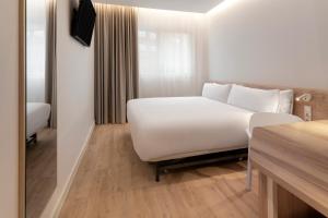 B&B HOTEL Madrid Carabanchel客房内的一张或多张床位