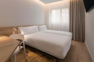 B&B HOTEL Madrid Carabanchel客房内的一张或多张床位
