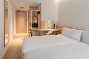 B&B HOTEL Madrid Carabanchel客房内的一张或多张床位