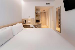 B&B HOTEL Madrid Carabanchel客房内的一张或多张床位