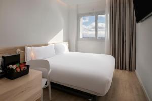 B&B HOTEL Madrid Carabanchel客房内的一张或多张床位