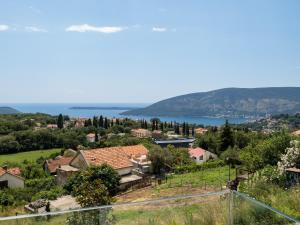 a village with a view of the water at "Soul Retreat" Villa in Brajkovina