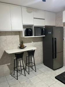 Η κουζίνα ή μικρή κουζίνα στο Casa na Praia da Pitoria