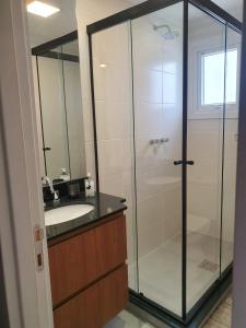 Bilik mandi di Loft bem localizado com vaga de garagem