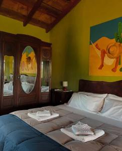 Ένα ή περισσότερα κρεβάτια σε δωμάτιο στο Frambuesas Suites +8 φωτογραφίες