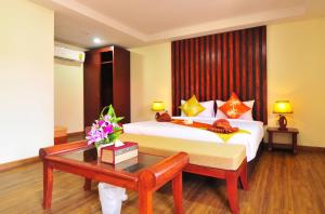 Una cama o camas en una habitación de Phi Phi Little Star Resort
