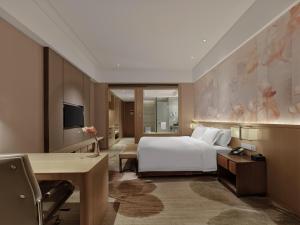Postel nebo postele na pokoji v ubytování Crowne Plaza Fuzhou Riverside by IHG