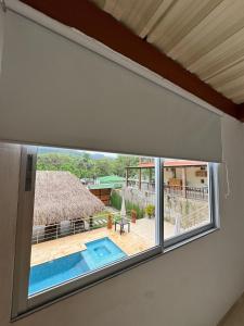 Bazén v ubytování KETHALYA TAYRONA Hostal nebo v jeho okolí