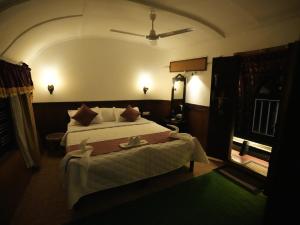 Kalappura Houseboats & Tours客房内的一张或多张床位