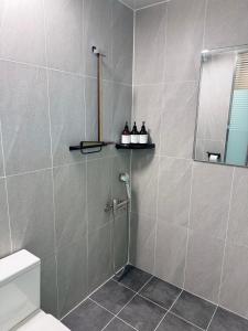 Koupelna v ubytování Hotel Unity + 7 fotografií