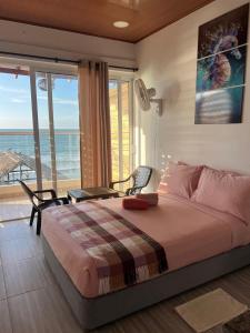 Postel nebo postele na pokoji v ubytování Sueños en la playa