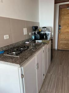 Kuchyň nebo kuchyňský kout v ubytování Sueños en la playa