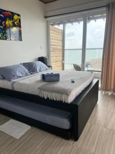 Postel nebo postele na pokoji v ubytování Sueños en la playa