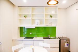 Кухня або міні-кухня у Palmier Hotel - Art House Da Nang
