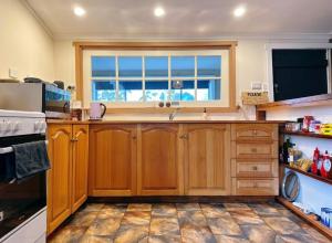 Kuchyň nebo kuchyňský kout v ubytování The Bushmill Cottage