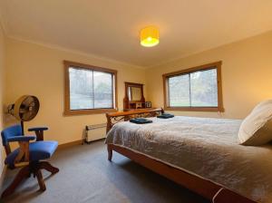 Postel nebo postele na pokoji v ubytování The Bushmill Cottage