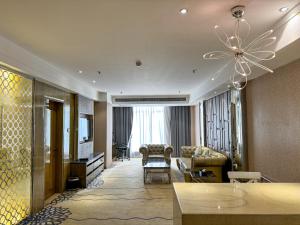 Posezení v ubytování Suning Universal Hotel ALL-SUITES